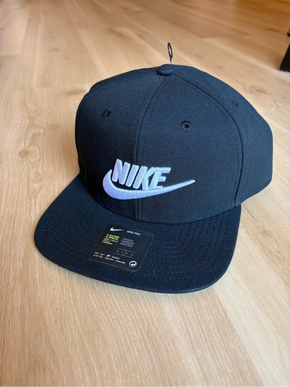 Nike Men’s Black Cap with White Iridescent Swoosh